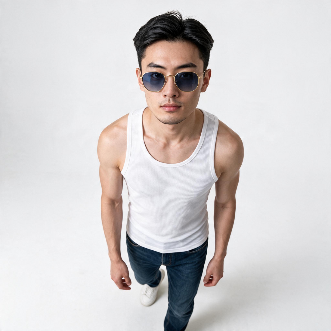 Model wearing lavunett Hexa Gold sunglasses